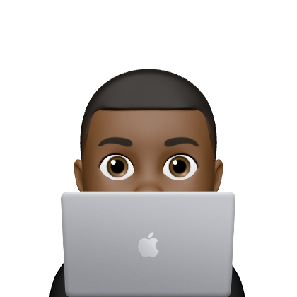 An Apple Memoji of an African-American male behind a Macbook. Not sponsored, btw